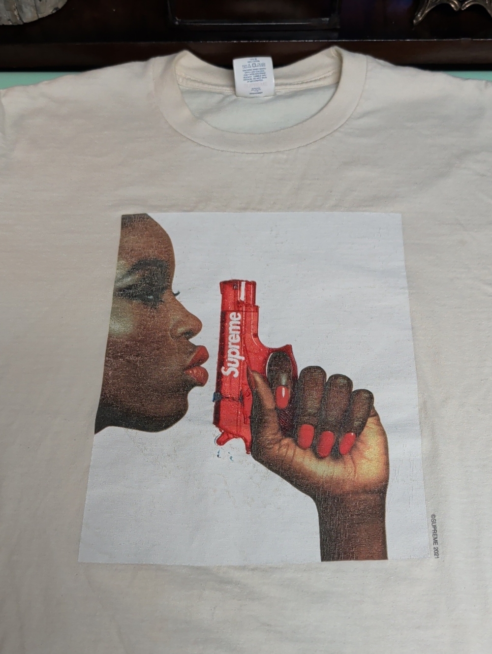 Supreme Cream Graphic Tee with Red Accent